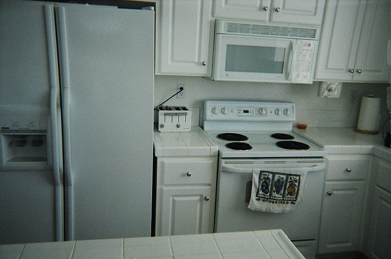 31300003.JPG - Old Appliances.  All of these had to go. Owner took fridge/toaster/can-opener.